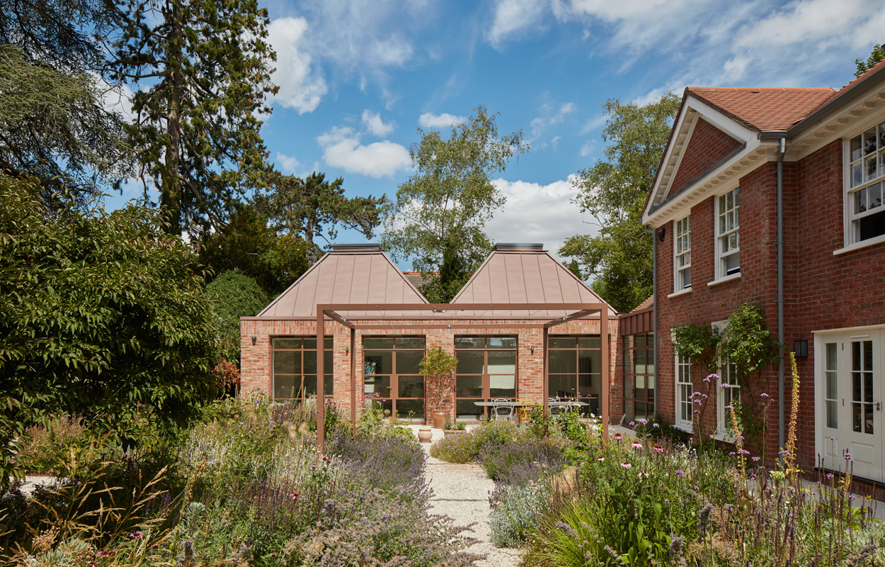 External photo of Lantern House extension with landscaped garden